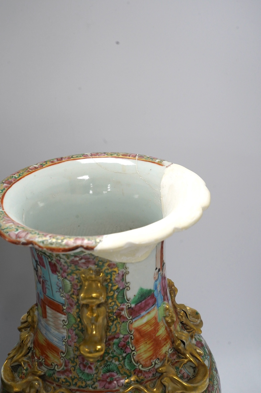 A pair of 19th century Chinese Canton famille rose vases, 36cm high. Condition - poor